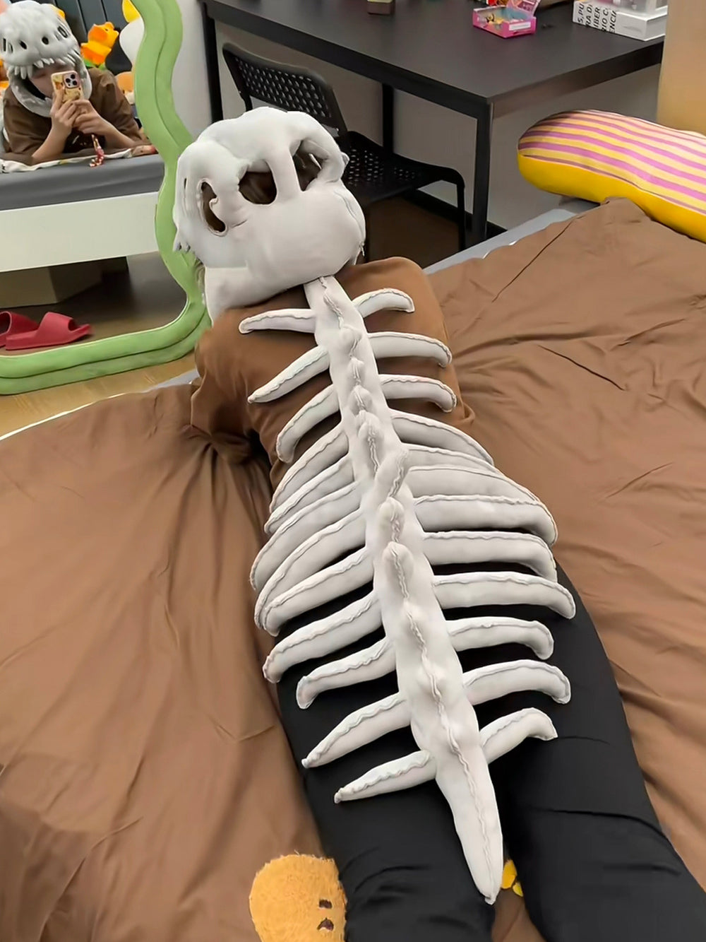 Soft plush dino skeleton detail