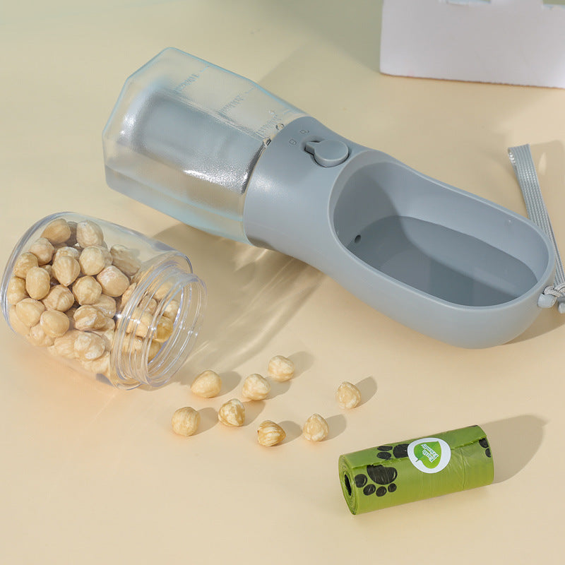 3-in-1 Pet Travel Water Bottle – Water, Food & Waste Bag Dispenser